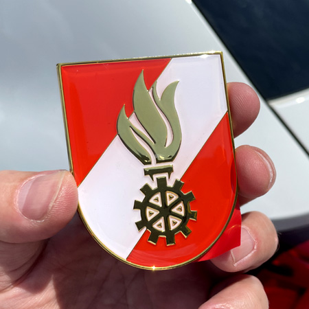 Autoplakette mit Korpszeichen